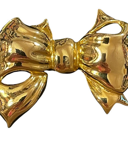 Gold finish shiny FUN bow brooch