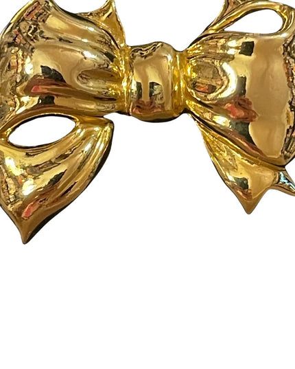 Gold finish shiny FUN bow brooch
