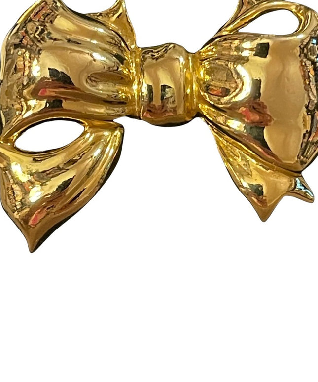 Gold finish shiny FUN bow brooch