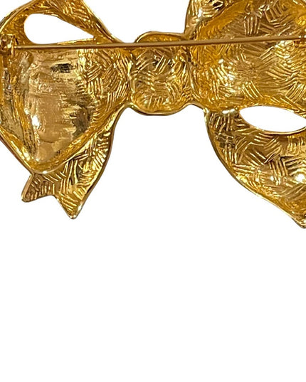 Gold finish shiny FUN bow brooch