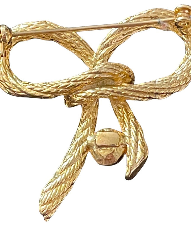 Gold finish daux pearl rope brooch fancy design