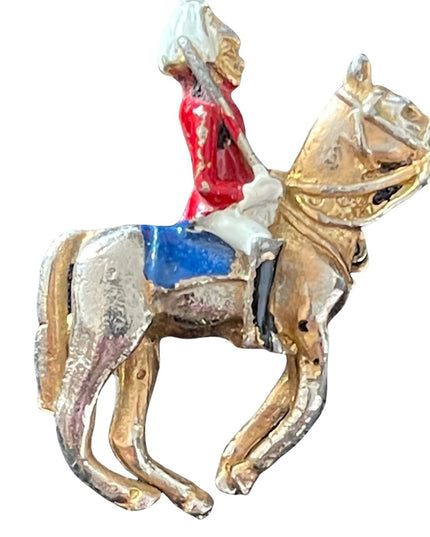 Vintage British soldier riding horse brooch