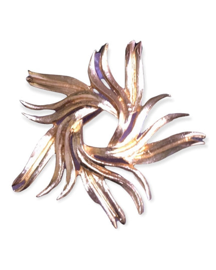 Vintage gold starburst swirl brooch 1960s