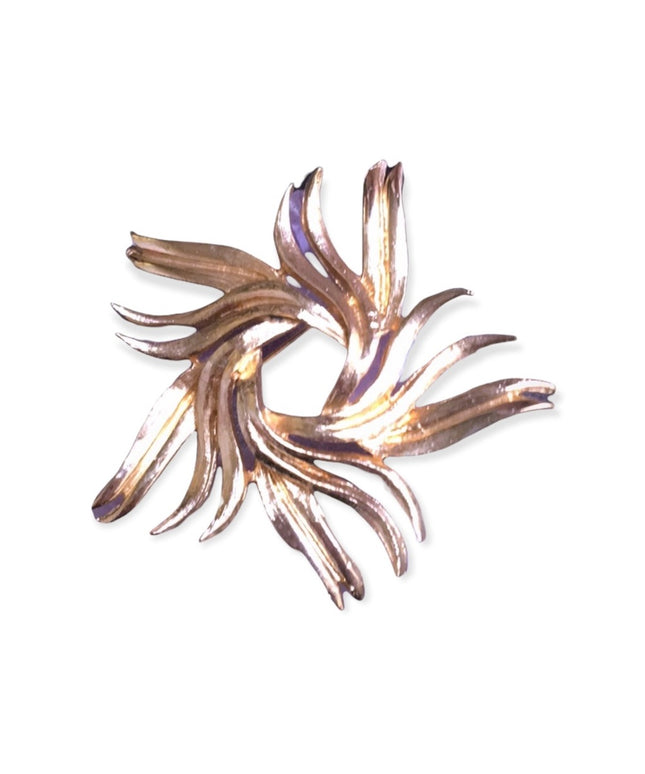 Vintage gold starburst swirl brooch 1960s