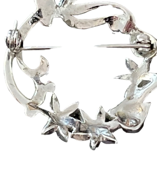 Silver finish fancy marcasite wreath brooch
