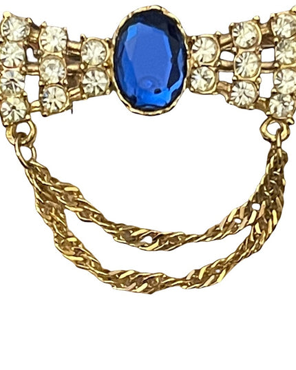 Vintage 1980s revival crystal resin brooch with gold finish magestic