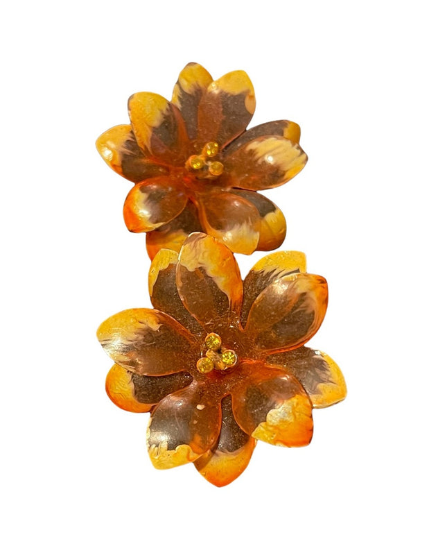 Vintage large orange plastic fancy flower clip on earrings