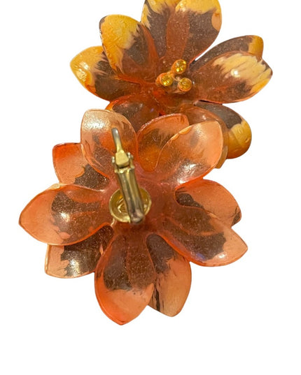 Vintage large orange plastic fancy flower clip on earrings