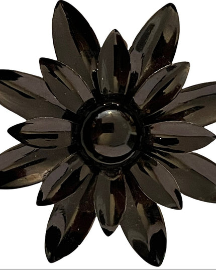 Vintage 1960s black flower metal groovy brooch
