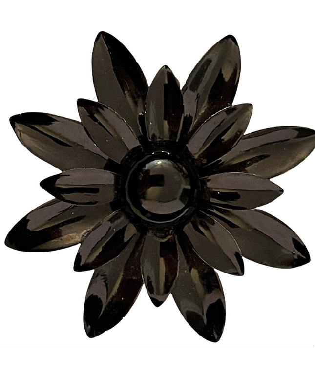 Vintage 1960s black flower metal groovy brooch