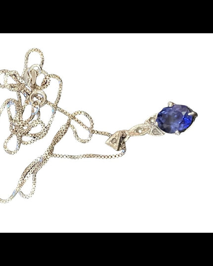 Sterling silver box chain with blue stone fancy dangle pendant