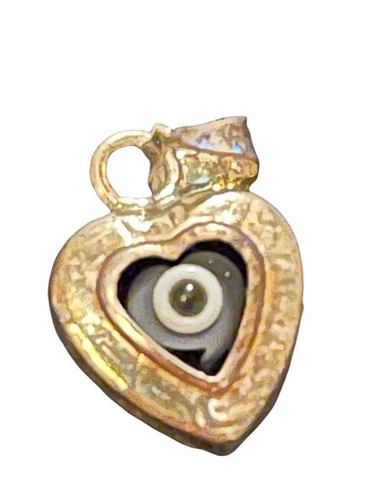 Sterling silver evil eye pendant .5”
