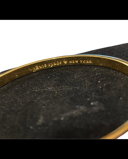 Kate Spade gold tone enameled multicolor bangel bracelet