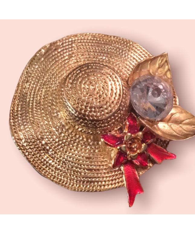 Gold tone hat crystal brooch