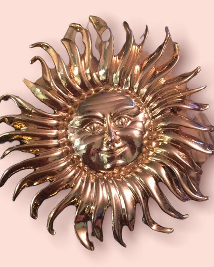 Gold tone heavy SUN brooch