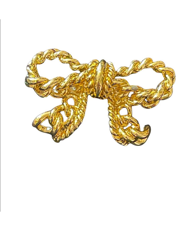 Vintage gold Nina Ricci bow brooch