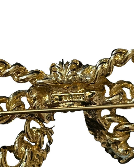 Vintage gold Nina Ricci bow brooch