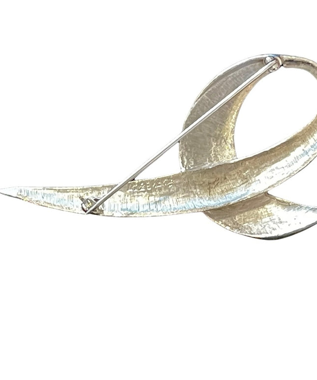 Fancy vintage brushed silver modernist brooch