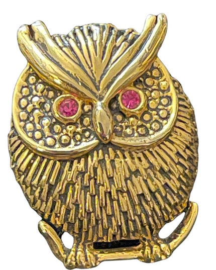 Antiqued gold finish pink crystal eye  brooch
