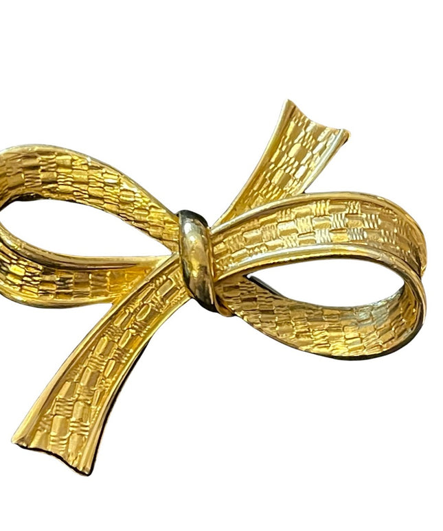 Large gold finish fancy bow brooch