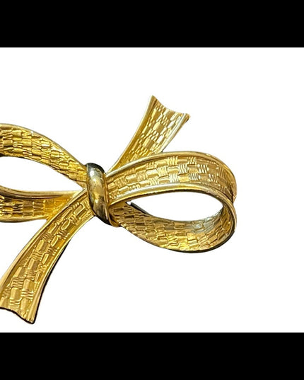 Large gold finish fancy bow brooch
