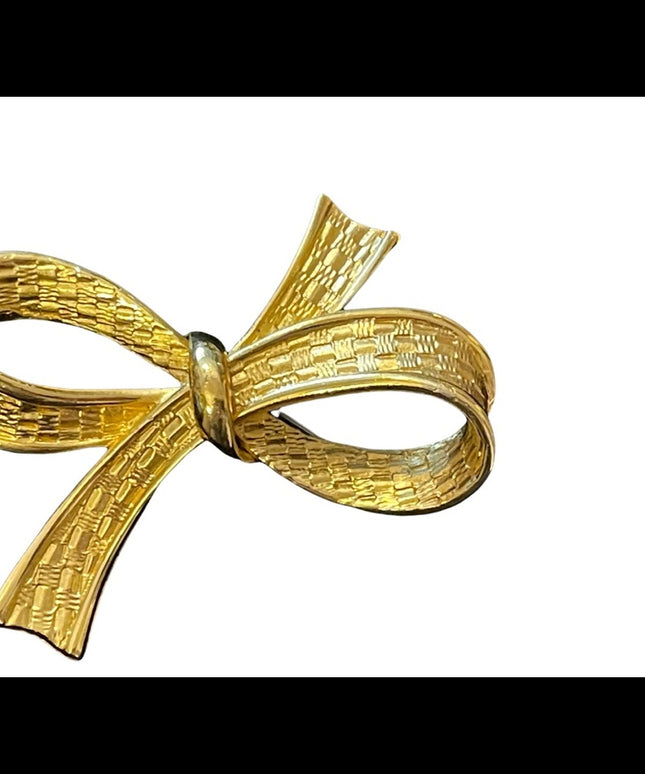 Large gold finish fancy bow brooch