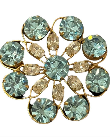 Vintage appx 1950s blue & clear crystal gold finish flower brooch