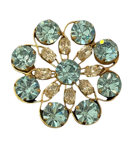 Vintage appx 1950s blue & clear crystal gold finish flower brooch