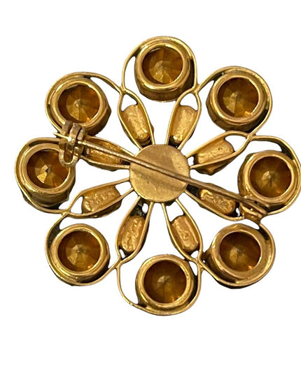 Vintage appx 1950s blue & clear crystal gold finish flower brooch