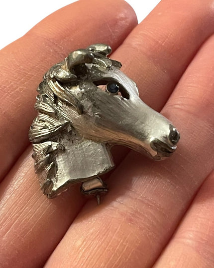 Vintage antiqued silver finish blue crystal eye horse brooch