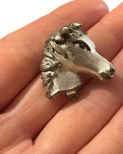 Vintage antiqued silver finish blue crystal eye horse brooch