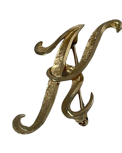 Vintage brushed gold Mamselle large K brooch