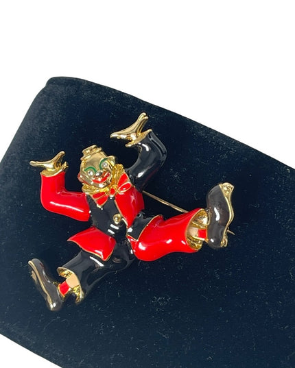 Fun’ Black & red enamel jumping clown circus gold finish brooch