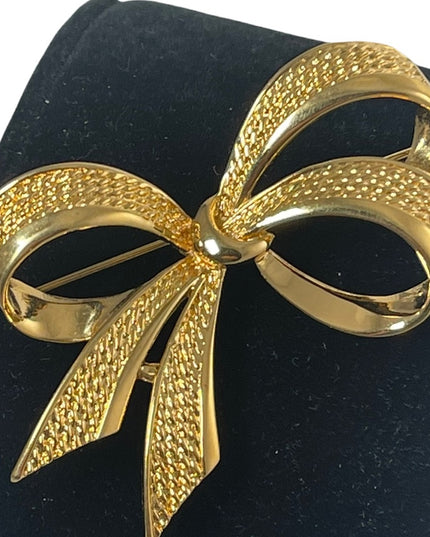Vintage gold NINA RICCI bow brooch large