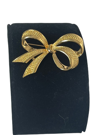 Vintage gold NINA RICCI bow brooch large