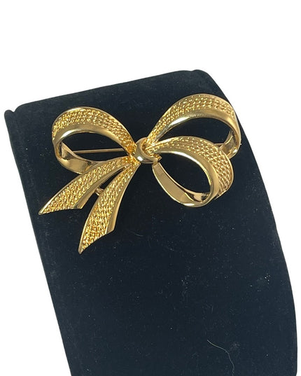 Vintage gold NINA RICCI bow brooch large