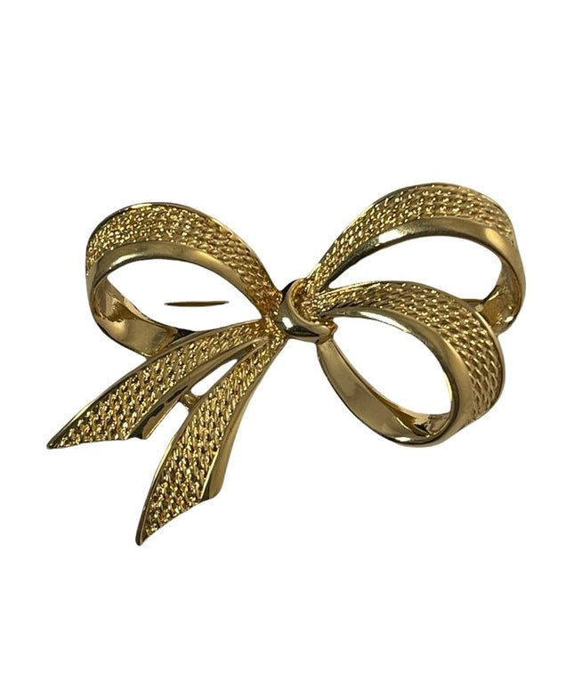 Vintage gold NINA RICCI bow brooch large