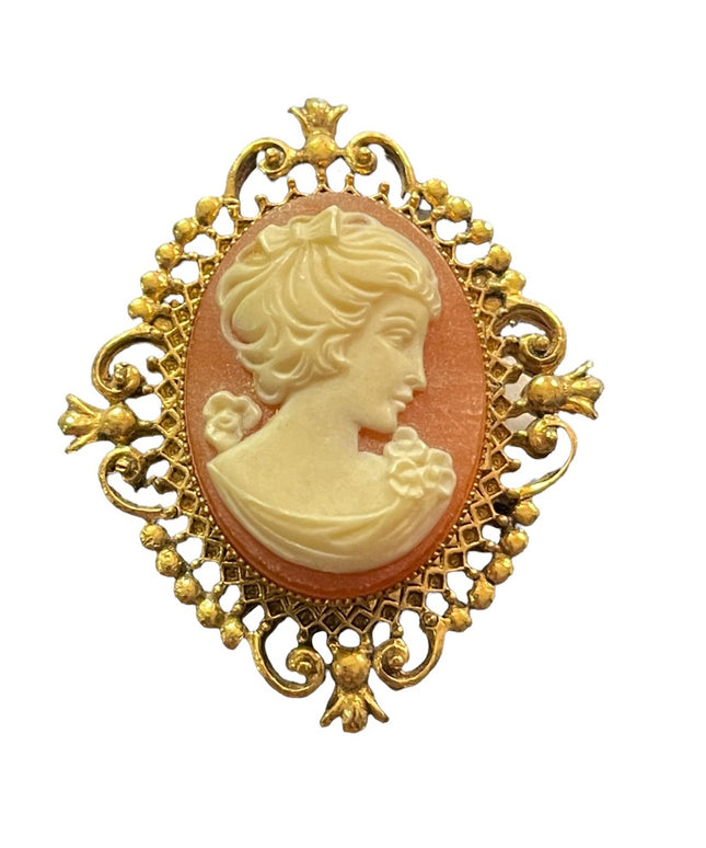 Vintage Avon Perfume resin cameo brooch opens for locket or perfume