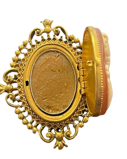 Vintage Avon Perfume resin cameo brooch opens for locket or perfume
