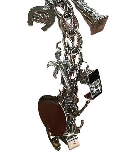 Vintage 1960s Sterling silver charm bracelet 10 charms