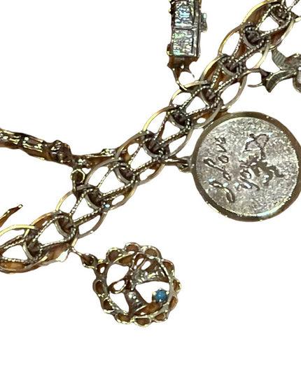 Vintage 1960s Sterling silver charm bracelet 10 charms