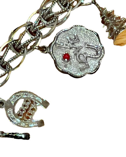 Vintage 1960s Sterling silver charm bracelet 10 charms