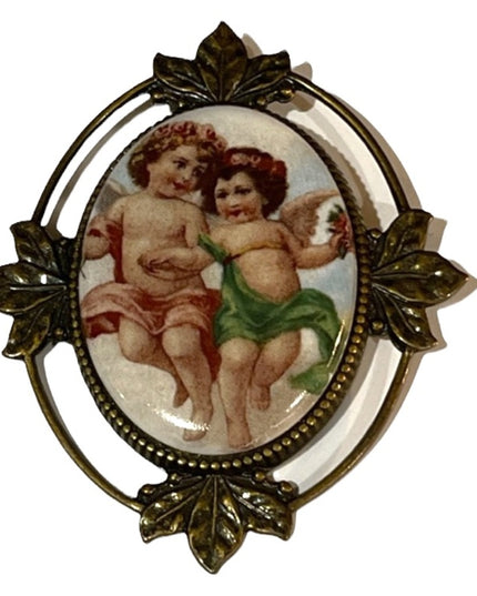 Angel Cherub pendant brooch antiqued