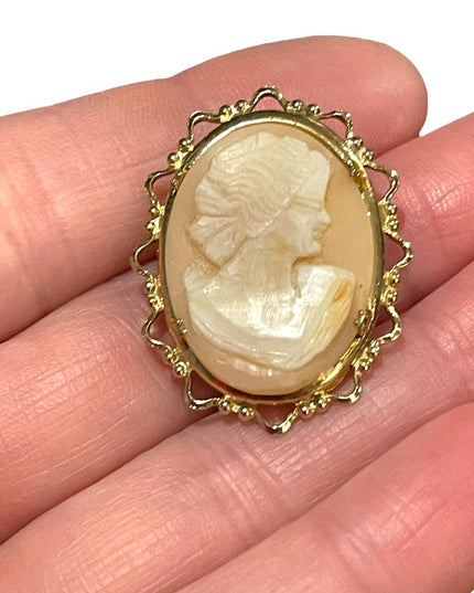 Vintage 1960s gold finish fancy bezel resin cameo brooch