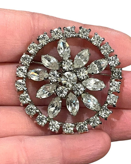 Vintage 1960s clear crystal round silver finish flower brooch