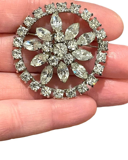 Vintage 1960s clear crystal round silver finish flower brooch