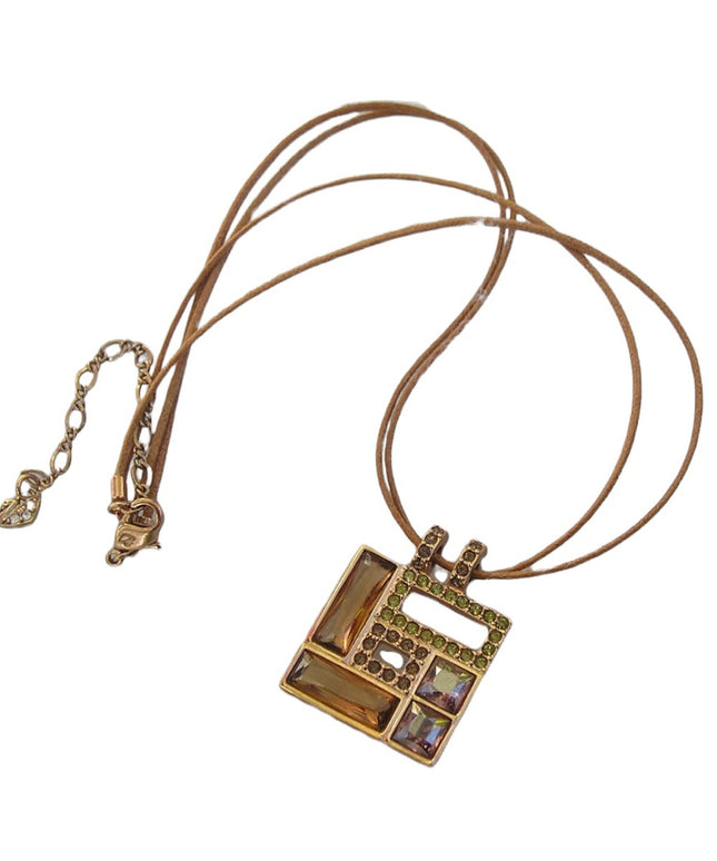 Swarovski Authentic (swan) Square crystal rose gold plt leather cord necklace