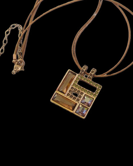 Swarovski Authentic (swan) Square crystal rose gold plt leather cord necklace