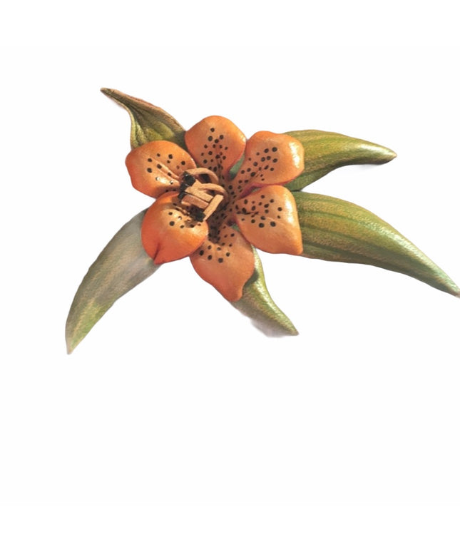 - Vintage Leather Island flower brooch