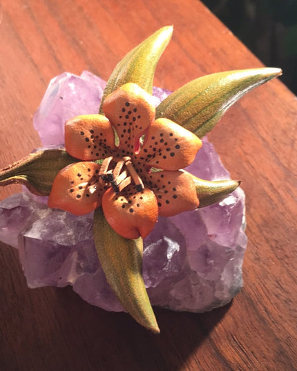 - Vintage Leather Island flower brooch